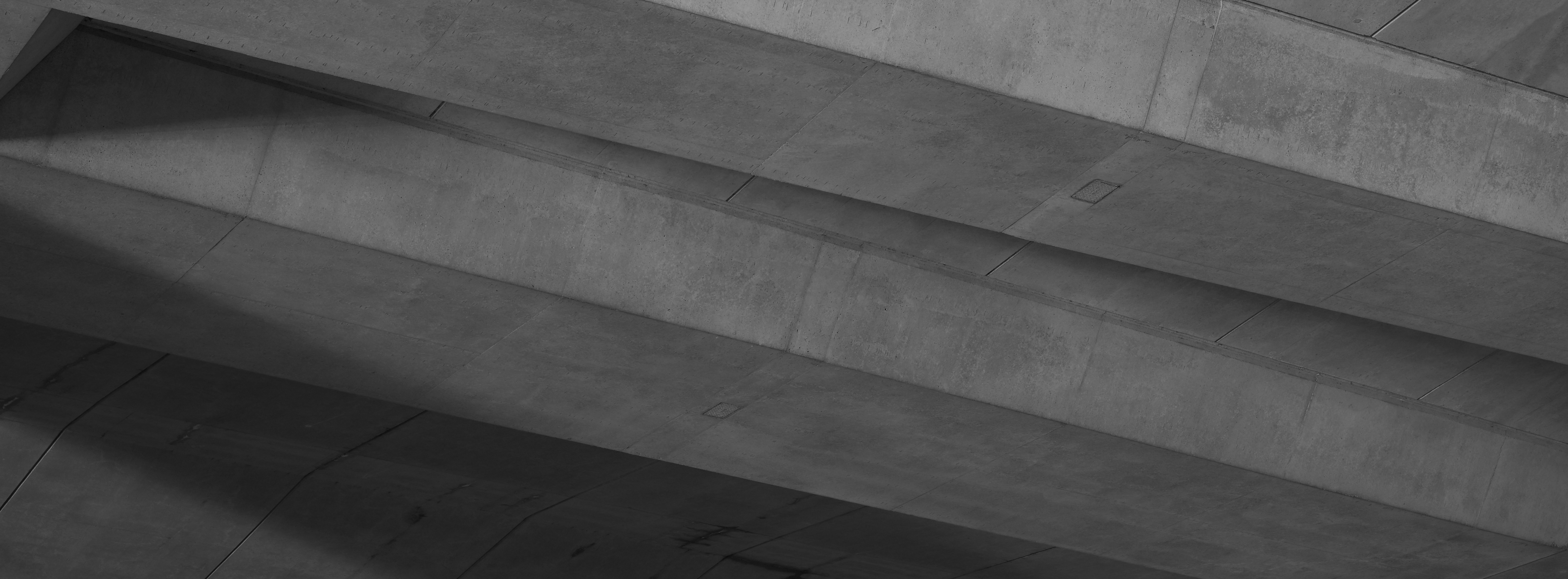 A black and white photo of a person on a skateboard